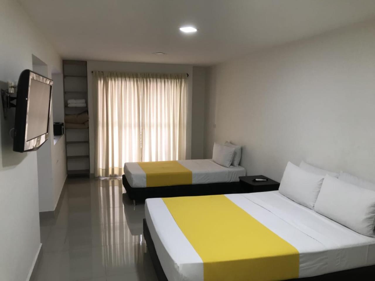 Laureles Apartahotel